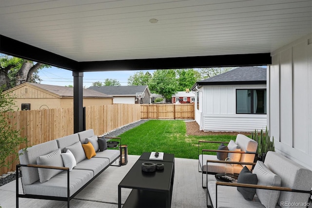view of patio / terrace with an outdoor living space and a fenced backyard