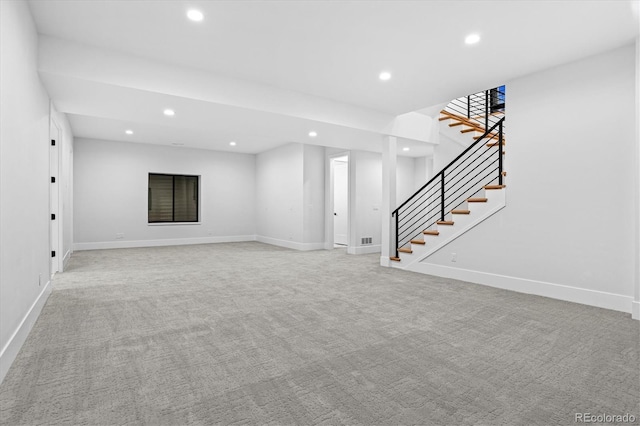 interior space with recessed lighting, carpet flooring, baseboards, and stairs
