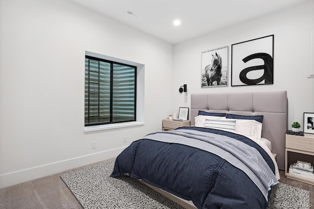 bedroom with recessed lighting, carpet, visible vents, and baseboards