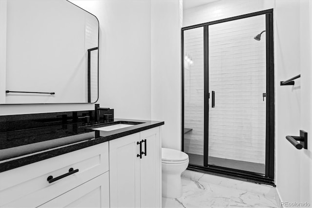 full bath with toilet, marble finish floor, a shower stall, and vanity