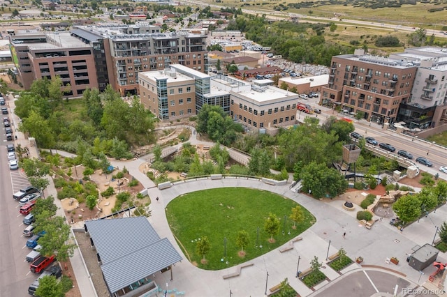 birds eye view of property with a city view