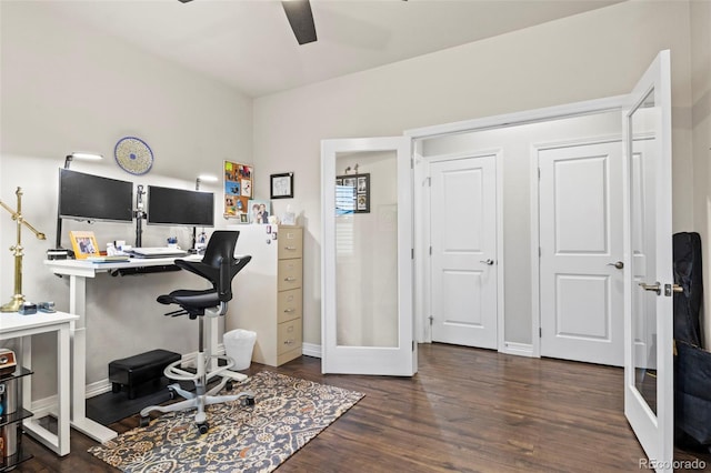 office area with ceiling fan, baseboards, and wood finished floors