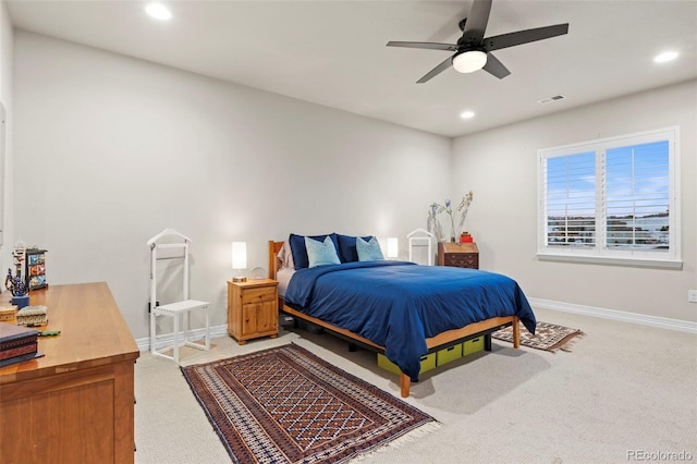 bedroom featuring visible vents, light carpet, recessed lighting, baseboards, and ceiling fan