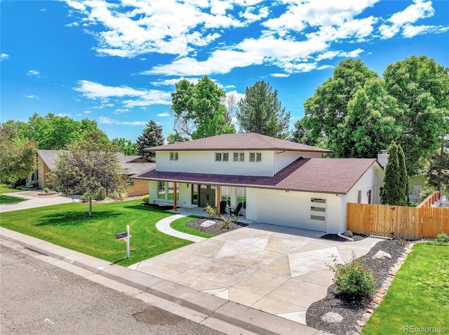 6716 W Rowland Ave, Littleton, CO 80128 - view of front of property featuring a porch, driveway, a shingled roof, and a garage