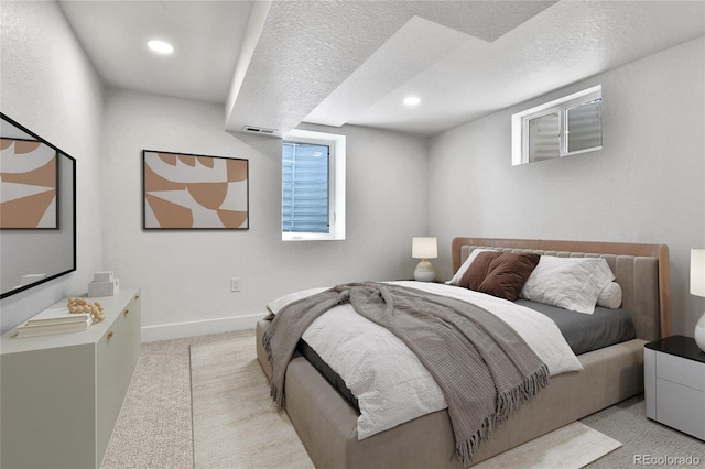 6716 W Rowland Ave, Littleton, CO 80128 - bedroom with light colored carpet, recessed lighting, and baseboards