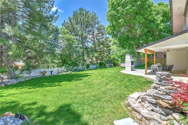 6716 W Rowland Ave, Littleton, CO 80128 - view of yard with a patio and a ceiling fan