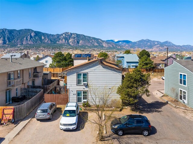 4310 Loomis Ave, Colorado Springs, CO 80906 - exterior space featuring fence, a mountain view, and a residential view