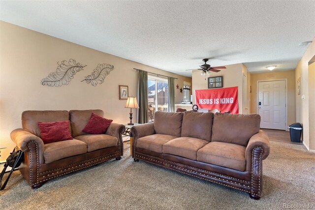 4310 Loomis Ave, Colorado Springs, CO 80906 - carpeted living area with a textured ceiling and ceiling fan