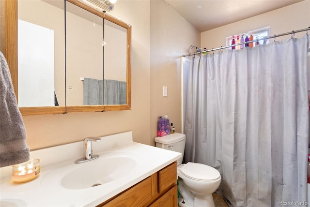 4310 Loomis Ave, Colorado Springs, CO 80906 - bathroom featuring a shower with curtain, toilet, and vanity