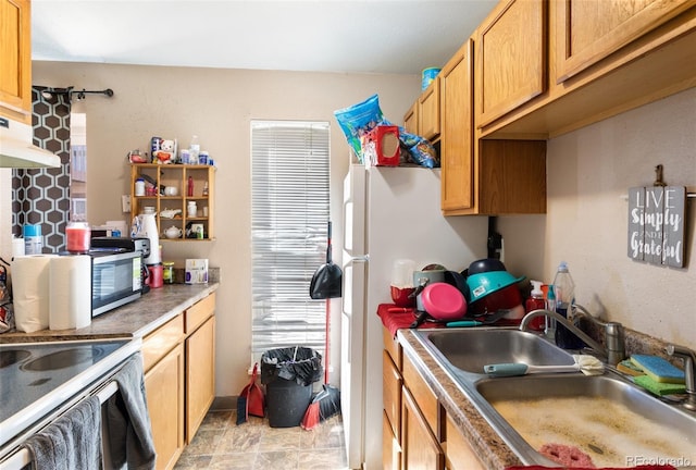 4310 Loomis Ave, Colorado Springs, CO 80906 - kitchen featuring freestanding refrigerator and a sink