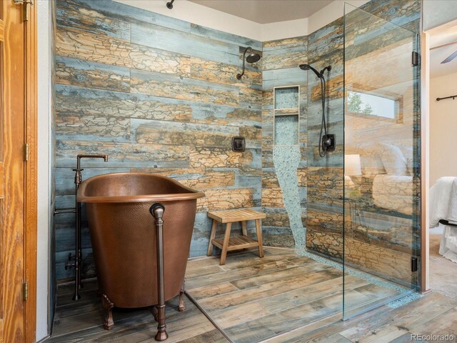 28465 Cragmont Dr, Evergreen, CO 80439 - bathroom featuring a shower stall and wood finished floors