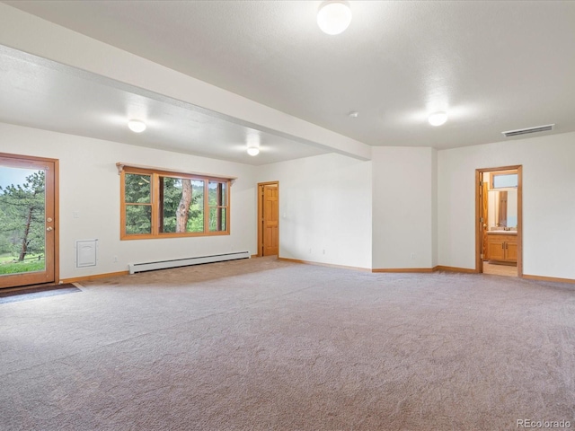 28465 Cragmont Dr, Evergreen, CO 80439 - spare room featuring a baseboard radiator and light colored carpet