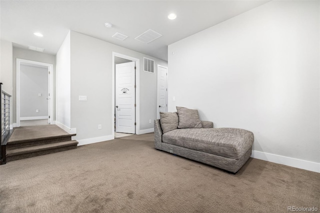 sitting room featuring carpet