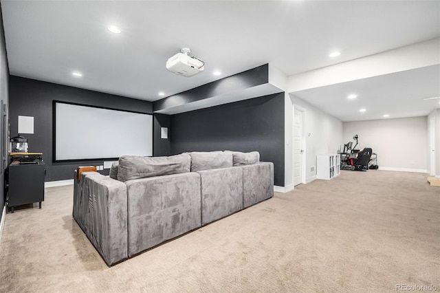 home theater room with light carpet