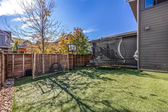 view of yard featuring a trampoline