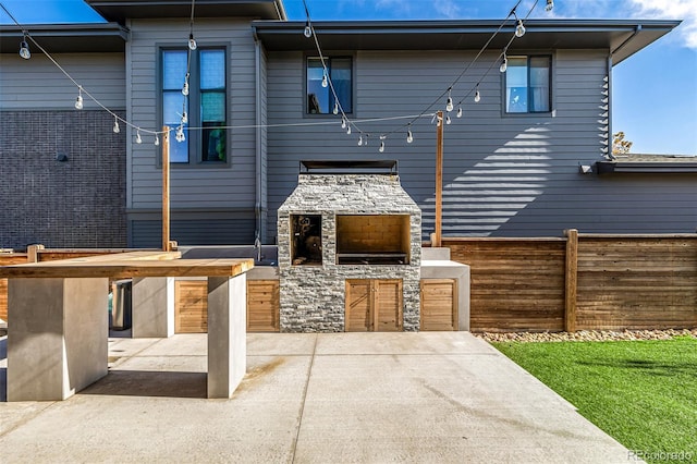 back of house with a patio