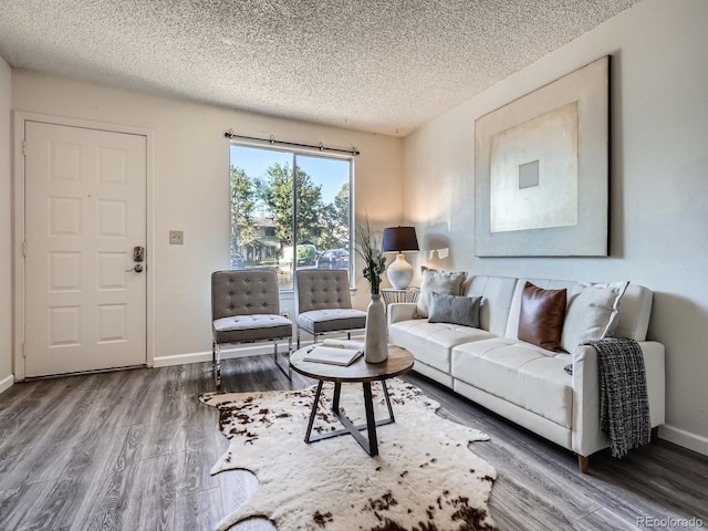 17681 E Loyola Dr Unit E, Aurora, CO 80013 - living area with wood finished floors and a textured ceiling