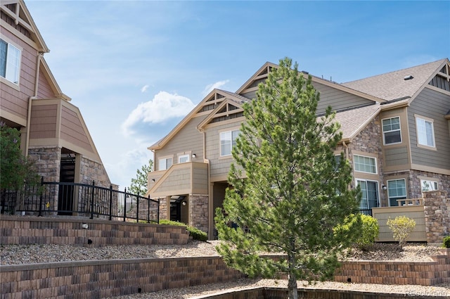 5732 S Addison Way # E, Aurora, CO 80016 - view of front facade featuring stone siding