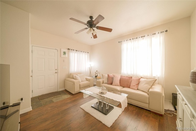 5732 S Addison Way # E, Aurora, CO 80016 - living room featuring healthy amount of natural light, ceiling fan, and dark wood-style flooring