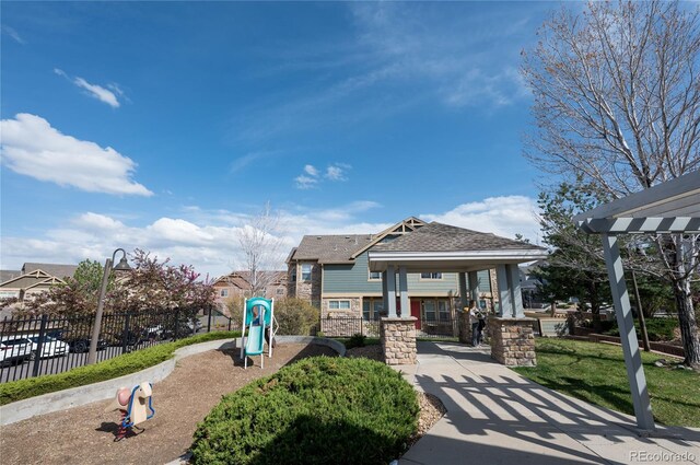 5732 S Addison Way # E, Aurora, CO 80016 - view of front of property featuring stone siding