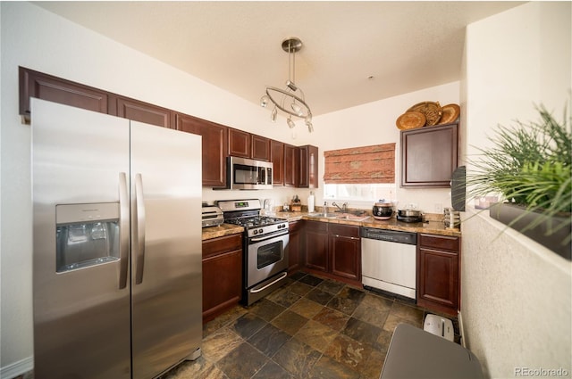 5732 S Addison Way # E, Aurora, CO 80016 - kitchen with stainless steel appliances, dark stone finish flooring, a sink, and light stone counters