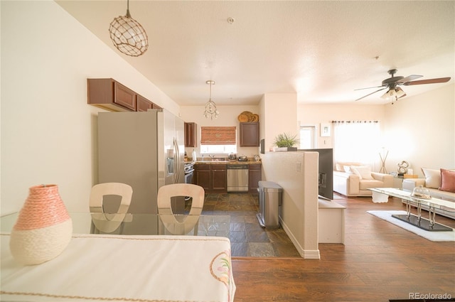 5732 S Addison Way # E, Aurora, CO 80016 - kitchen featuring stainless steel appliances, plenty of natural light, pendant lighting, and open floor plan