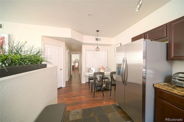5732 S Addison Way # E, Aurora, CO 80016 - kitchen with stainless steel fridge with ice dispenser, hanging light fixtures, dark stone finish floors, and dark brown cabinets