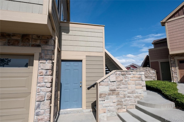 5732 S Addison Way # E, Aurora, CO 80016 - entrance to property featuring stone siding