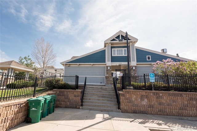 5732 S Addison Way # E, Aurora, CO 80016 - view of front of home featuring a fenced front yard