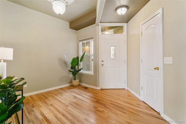 foyer featuring light wood-type flooring