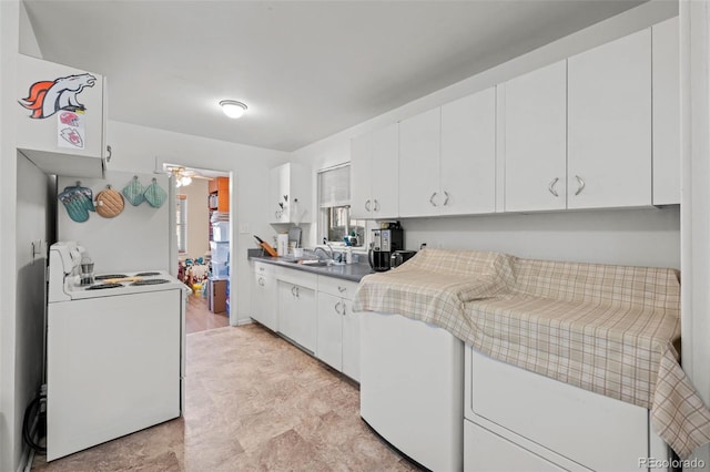 kitchen with ceiling fan, sink, white cabinets, and white electric range