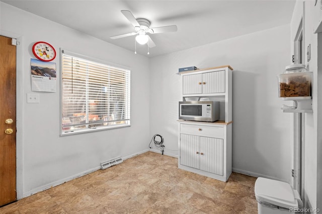 washroom with ceiling fan