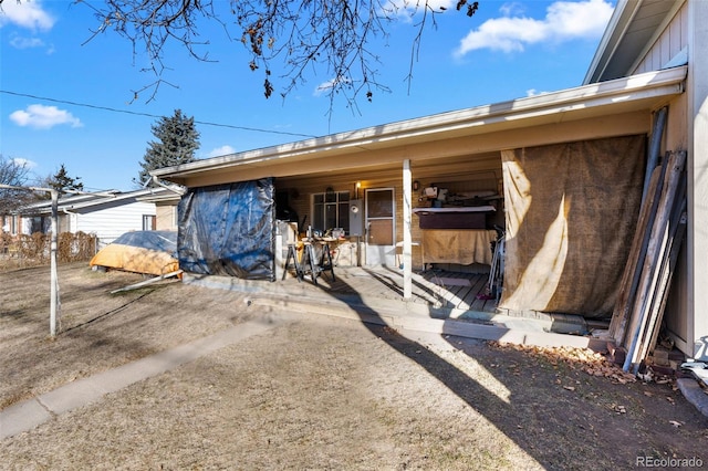 view of front of property featuring an outbuilding