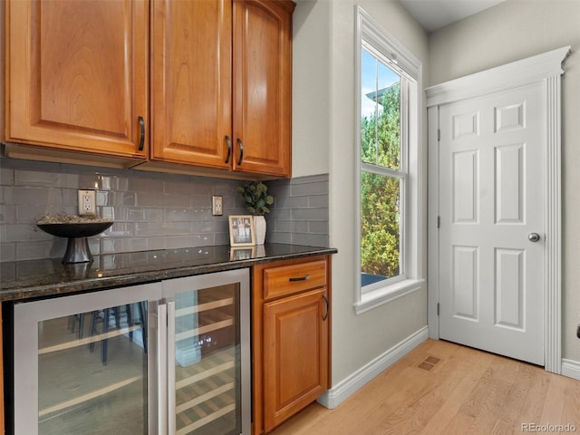 2821 Fulton St, Denver, CO 80238 - bar with plenty of natural light, tasteful backsplash, and wine cooler