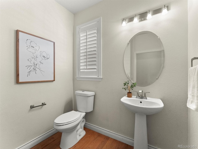 2821 Fulton St, Denver, CO 80238 - half bath with wood finished floors and baseboards