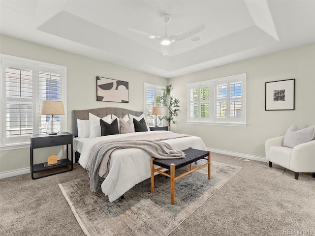 2821 Fulton St, Denver, CO 80238 - carpeted bedroom with a raised ceiling and a ceiling fan
