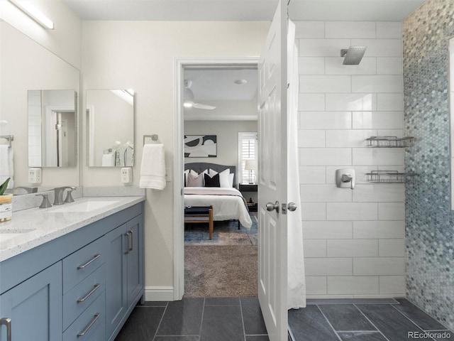 2821 Fulton St, Denver, CO 80238 - ensuite bathroom with double vanity, tiled shower, and tile patterned floors