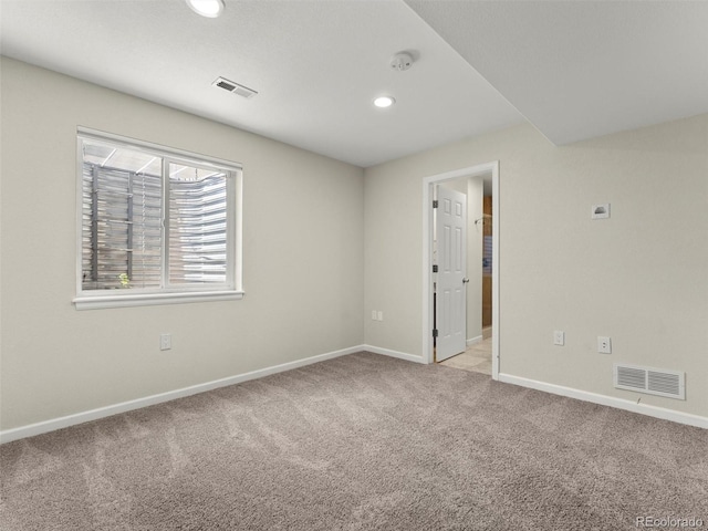 2821 Fulton St, Denver, CO 80238 - spare room with a smoke detector, light carpet, and recessed lighting