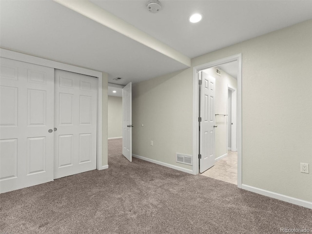 2821 Fulton St, Denver, CO 80238 - unfurnished bedroom featuring carpet flooring, a closet, and recessed lighting