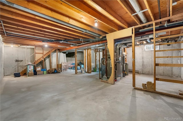 1758 S Tucson St, Aurora, CO 80012 - unfinished below grade area with stairway and heating unit