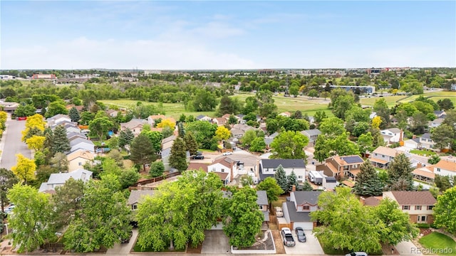 1758 S Tucson St, Aurora, CO 80012 - aerial perspective of suburban area with a tree filled landscape
