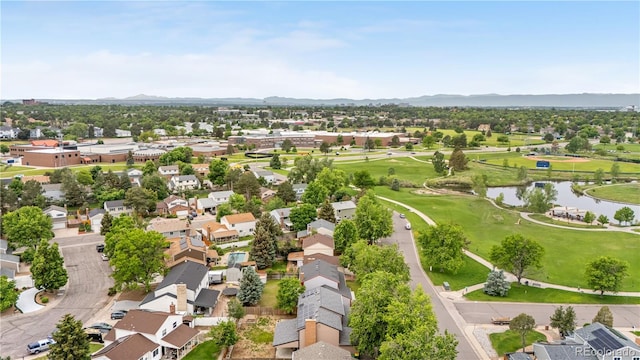 1758 S Tucson St, Aurora, CO 80012 - aerial perspective of suburban area with a water and mountain view and a golf club