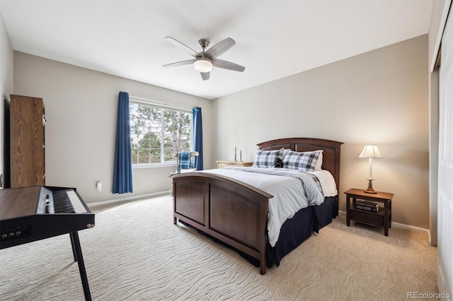5810 Moss Ct, Golden, CO 80403 - bedroom with light colored carpet and a ceiling fan