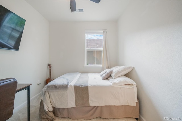 bedroom with ceiling fan and carpet floors