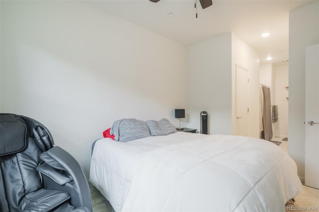 carpeted bedroom featuring ceiling fan