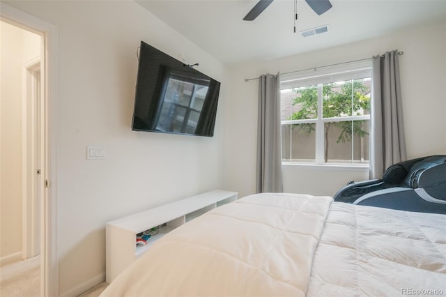 bedroom featuring ceiling fan and carpet flooring