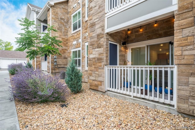 property entrance with a balcony