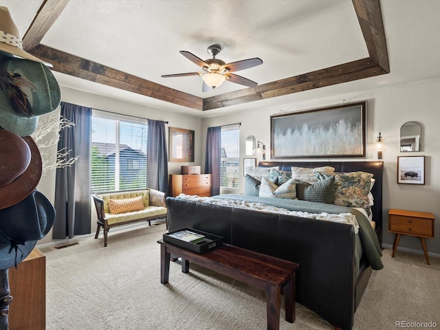 10273 Salida St, Commerce City, CO 80022 - bedroom with visible vents, baseboards, carpet flooring, and a tray ceiling