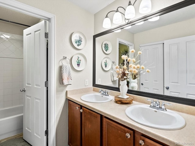 10273 Salida St, Commerce City, CO 80022 - full bath with shower / bath combination, a sink, and double vanity