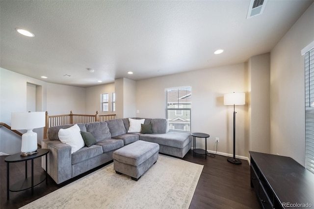 living room with dark wood-type flooring